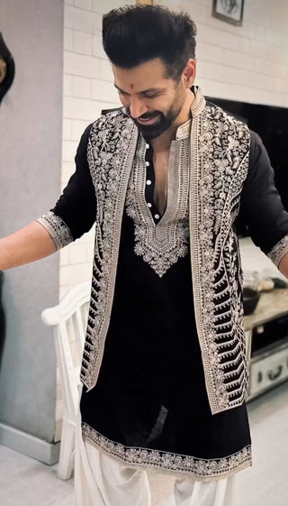 Rithvikk in Men's Embroidered Waistcoat and Kurta Pyjama.