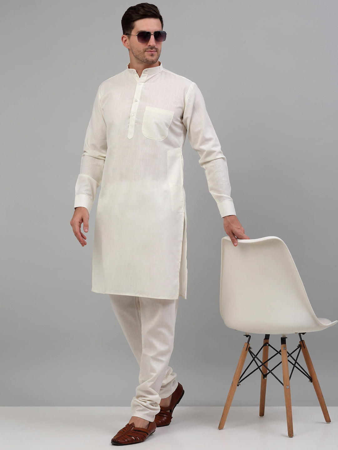 Men Nehru Jacket with White Kurta Pyjama.
