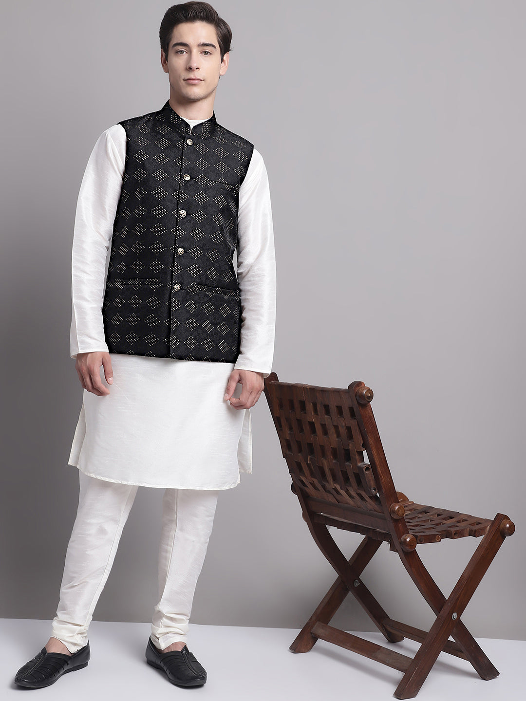 Men's Black Woven Design Nehru Jacket With Solid Kurta Pyjama.