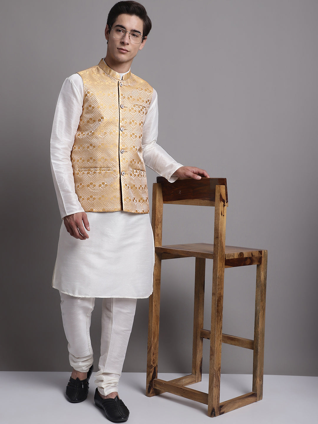 Men's Golden Woven Design Nehru Jacket With Solid Kurta Pyjama.